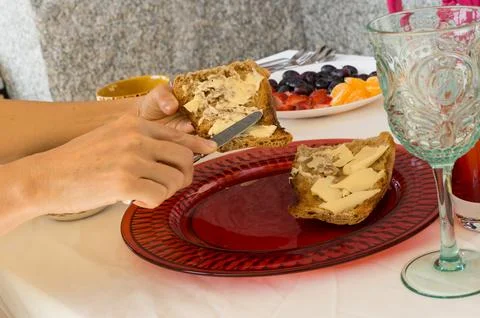 Spreading butter Stock Photos