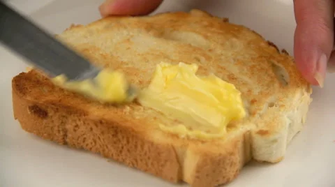 Spreading Butter On Toast Stock Footage 67826123