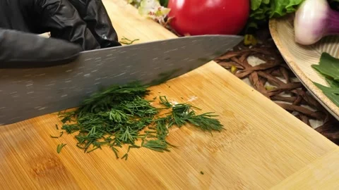 Spreading Carrots onto the Frying Pan Stock Footage 311391098
