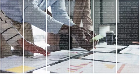 Spreading charts across table, four colleagues collaborating, annotating sheets Stock Footage 318607769