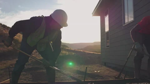 Spreading concrete in sunshine Stock Footage 55165466