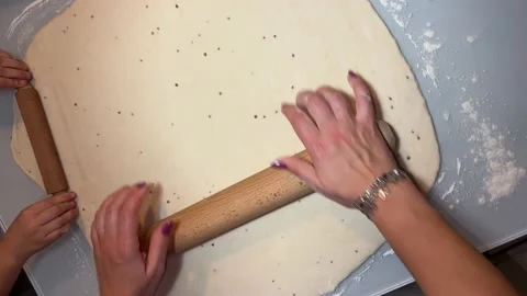 Spreading the dough Stock Footage 221202045