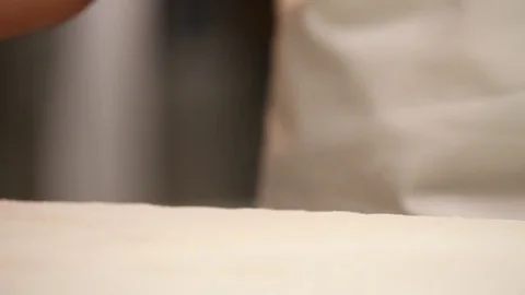 Spreading flour Stock Footage 77053336