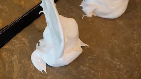 Spreading Fluffy White Meringue on Baking Sheet for Pavlova Dessert Stock Footage 331780665