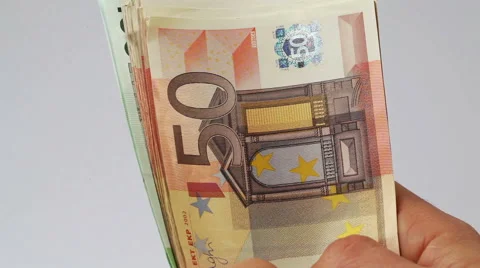 Spreading a large stack of Euro bills Stock Footage 46095608