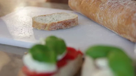 Spreading liverwurst on bread Stock Footage 41278652