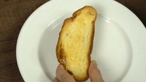 Spreading organic orange jam on bread Stock Footage 113074874