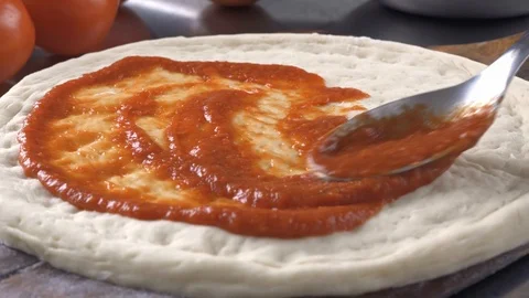 Spreading Pizza Sauce Stock Footage 119847848