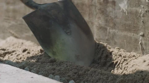 Spreading sand with a shovel Stock-Footage 255857120