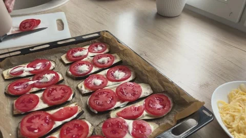 Spreading Sauce Over Eggplant And Tomatoes Preparing Dish For Baking Close Shot Video stock 336445256