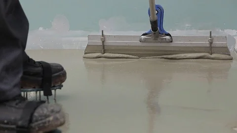 Spreading self leveling screed Stock Footage 111939066