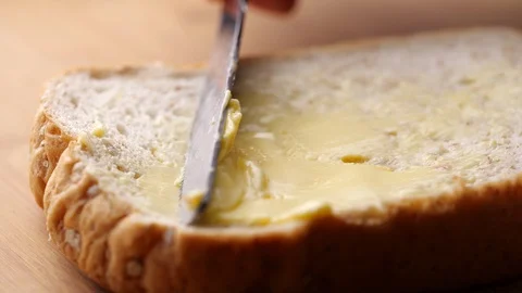 Spreading Vegan Butter on bread. 스톡 동영상 128556553