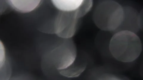 Spreading white lights in the blackness, close-up Видео 317451476
