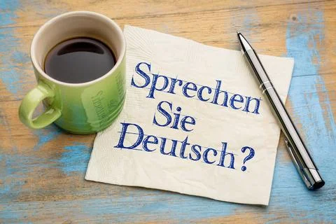 Sprechen Sie Deutsch? Sprechen Sie Deutsch? Do you speak German? Handwriti... Stock Photos