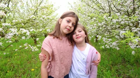 Spring Adventures: Playing in the Blooming Garden Stock Footage 301587026