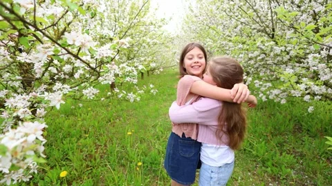Spring Adventures: Playing in the Blooming Garden Stock Footage 301587039