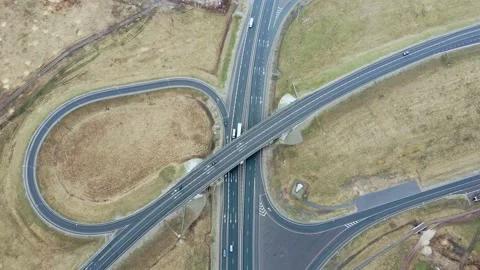 Spring aerial photography of a traffic intersection, view of the day of the road Video stock 154388635