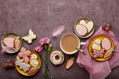 Spring aesthetic Easter background complete coffee cup, decorated glazed cookies Stock Photos