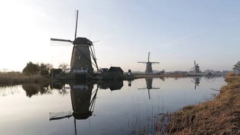 Spring afternoon in the area of windmills in Kinderdijk in Holland Stock Footage 74419142