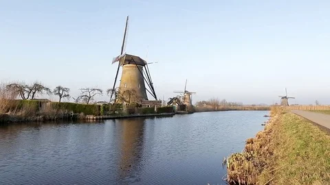 Spring afternoon in the area of windmills in Kinderdijk in Holland Stock Footage 74419478