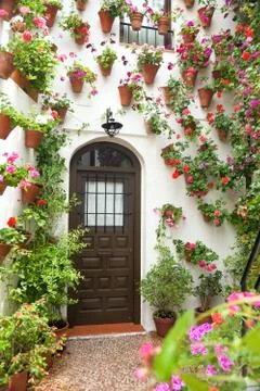 Spring and easter flowers decoration of old house, spain, europe Stock Photos