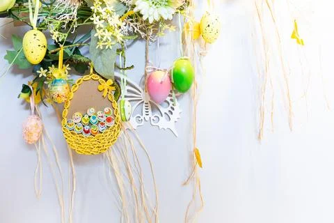 Spring and Easter hanging wall decorations with colorful Easter eggs Stock-Fotos