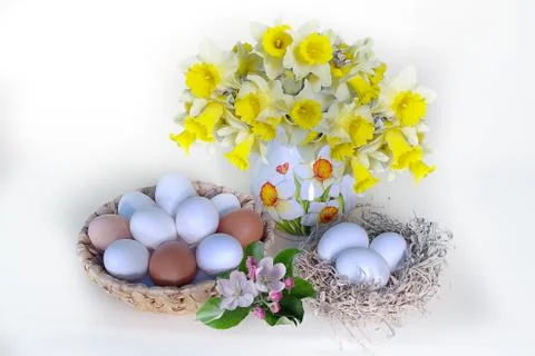 Spring and Easter still-life. Festive table decoration with colored eggs and  写真素材