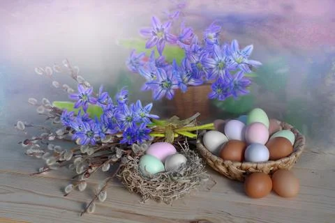 Spring and Easter still-life.Festive table decoration with colored eggs and s 写真素材