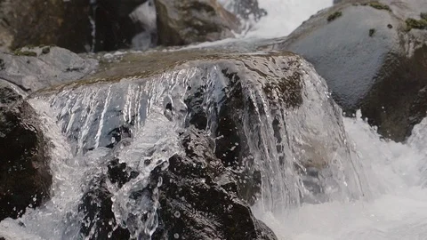 Spring and rocks close up slow motion Stock Footage 104825793