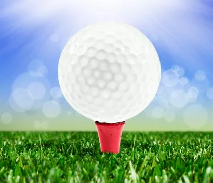Spring background with a golf ball on a peg Stock Photos