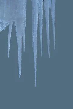 Spring background with icicles melting in the sun Stock Photos