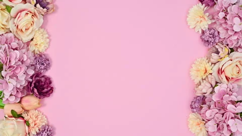Spring blooming flowers appear on left and right side of pink theme. Stop motion 스톡 동영상 166371811