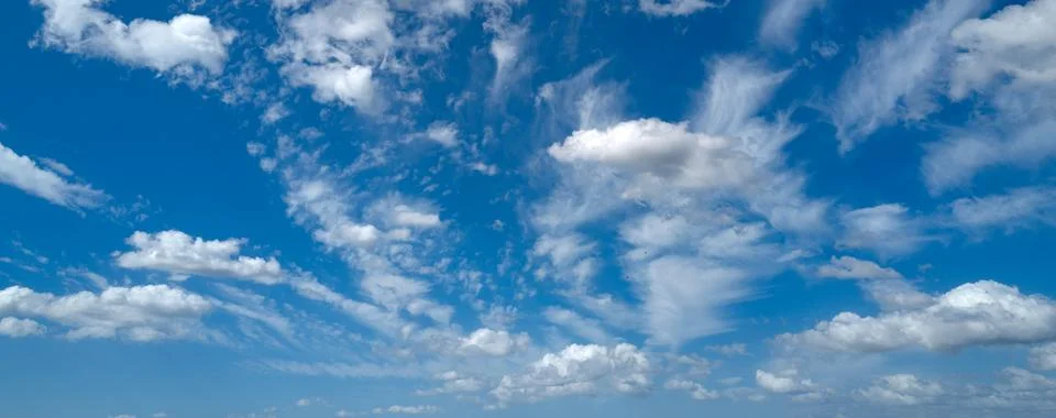 Spring blue sky cloud gradient background. Cloudy sky. Vivid cyan blue landscape Stock Photos
