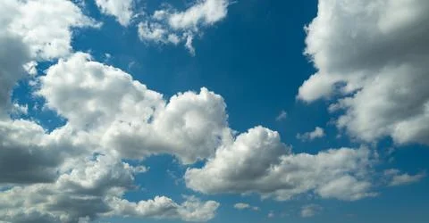 Spring blue sky cloud gradient background. Cloudy sky. Vivid cyan blue landscape Stock Photos