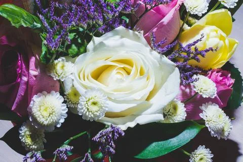 Spring bouquet of bright multi-colored flowers close-up. Stock Photos