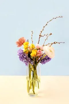 Spring bouquet in vase on the table Stock Photos