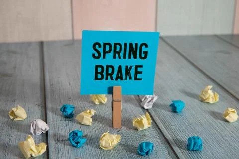 Spring Brake text on notepad, concept background. Stock Photos