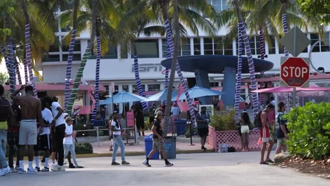 Spring Break Tourists Walking by Ocean Drive Restaurant South Beach Miami Stock Footage 150574007