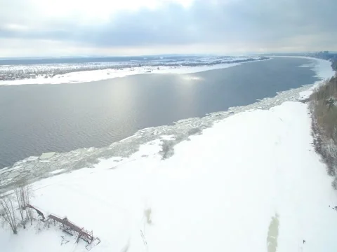 Spring broad river and sun through the clouds aerial view Stockbeeldmateriaal 73334209