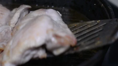 Spring chicken on a grill pan. selective soft focus. Stockbeeldmateriaal 149840463