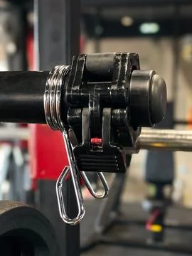 Spring clamp and quick-release locking collar for a barbell 스톡 사진