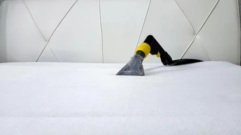 Spring cleaning or regular cleaning of the mattress. Stock Photos