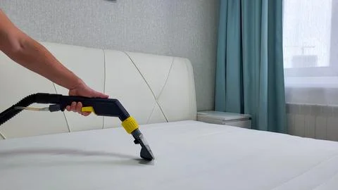 Spring cleaning or regular cleaning of the mattress. Stock Photos