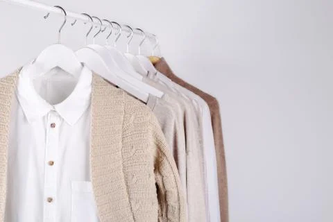 Spring clothes hanging on a rack Stock Photos