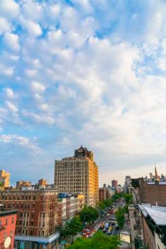 Spring clouds float over the East Village buildings at New York City. Foto stock