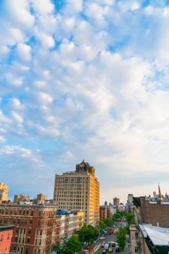 Spring clouds float over the East Village buildings at New York City. Foto stock