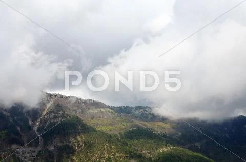 Spring cloudy view of slope of aj-petri mount (ukraine) Stock Photos