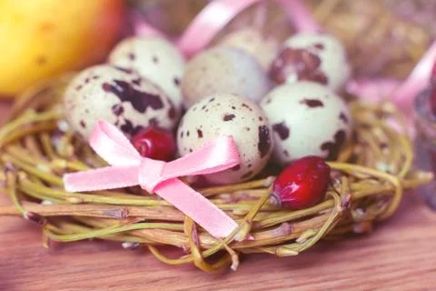 Spring composition, nest with eggs near the bunch of heather, Easter. Stock Photos