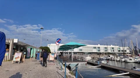 Spring Day Walking Through Belem Lisbon With Portuguese Architecture And Visitor Stock Footage 344807353