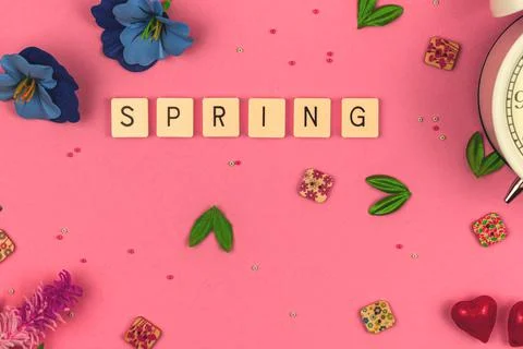 Spring decorative background, flat lay concept on a vibrant pink with decorat Stock Photos